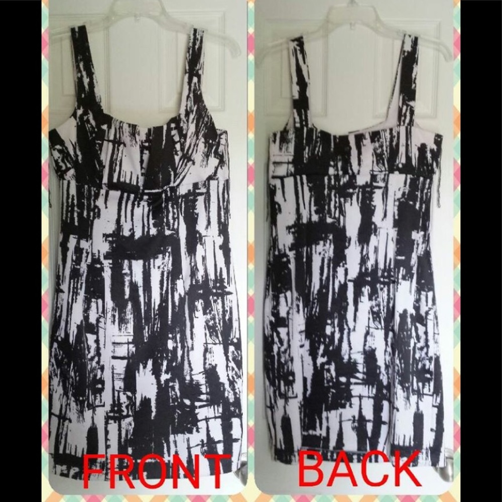 Black and white mini form fitting dress